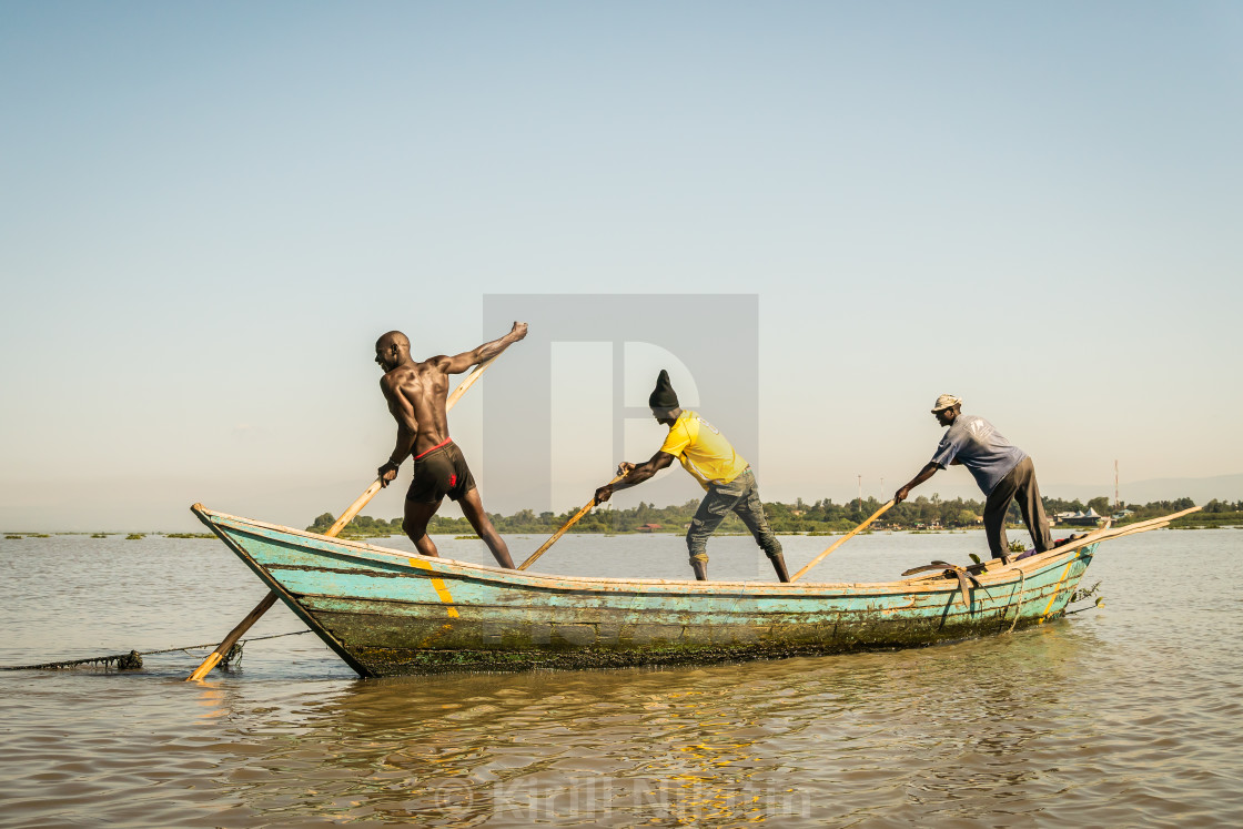 "near Kisumu, Kenya - March 8, 2019 - fishermen in a coast of lake Victoria" stock image