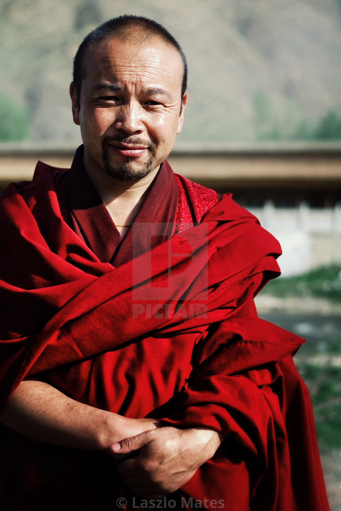 Editor skipper skrig young tibetan buddhist monk in a red dress in front of his monastery temple - License, download or print for £1.24 | Photos | Picfair Editor skipper skrig young tibetan buddhist monk in a red dress in front of his monastery temple - License, download or print for £1.24 | Photos | Picfair