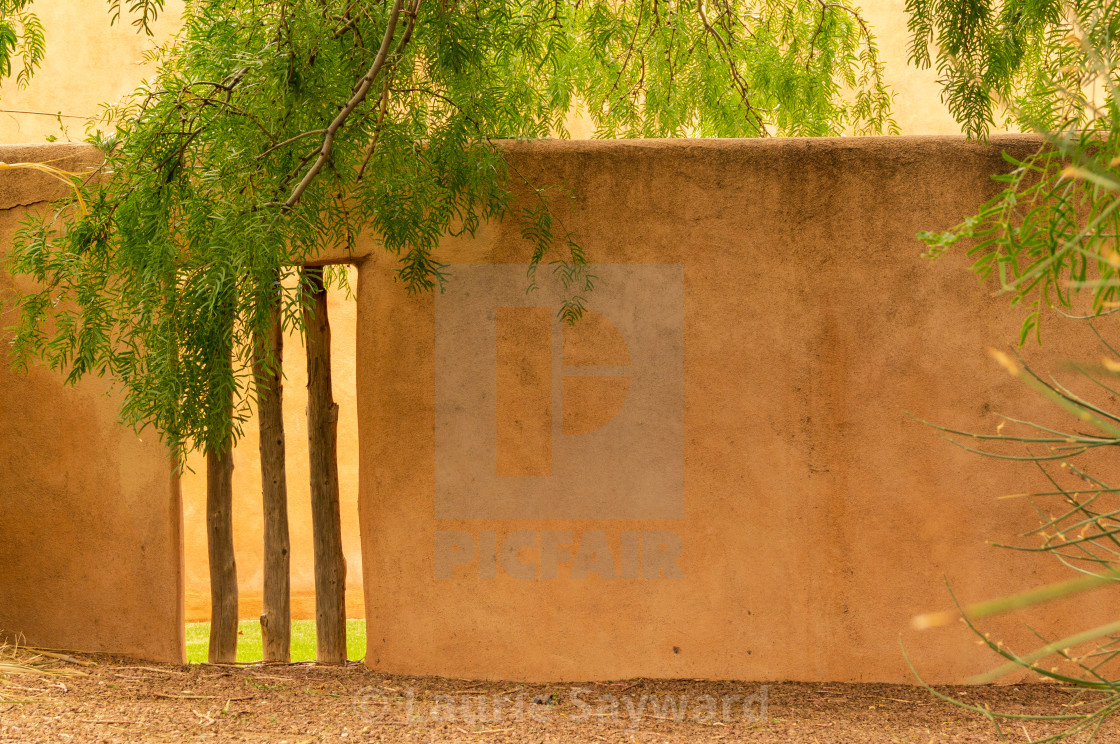 "View Through Stucco Wall" by Laurie Sayward - $9.13 "View Through Stucco Wall" stock image