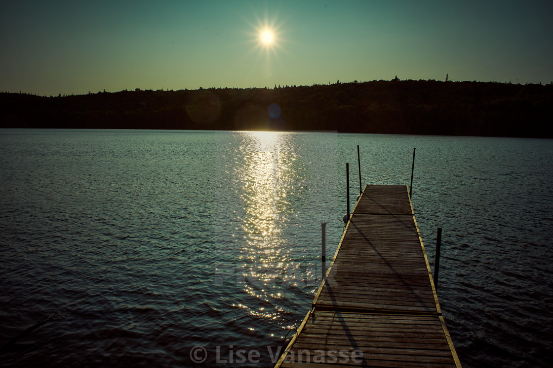 "The lake at sunset." by Lise Vanasse - $1.52 "The lake at sunset." stock image