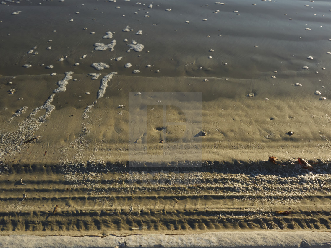 "Car tracks in the sand." by Lise Vanasse - $1.52 "Car tracks in the sand." stock image
