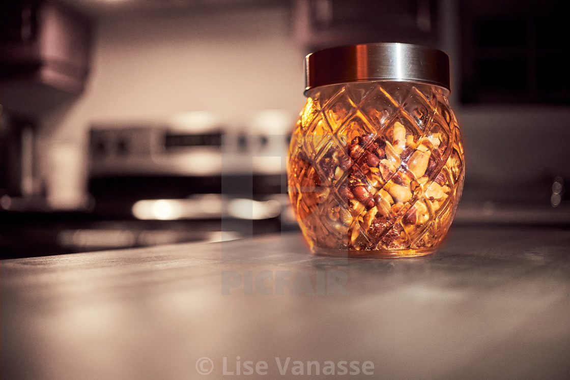 "A bowl of peanuts in a kitchen." by Lise Vanasse - $1.52 "A bowl of peanuts in a kitchen." stock image