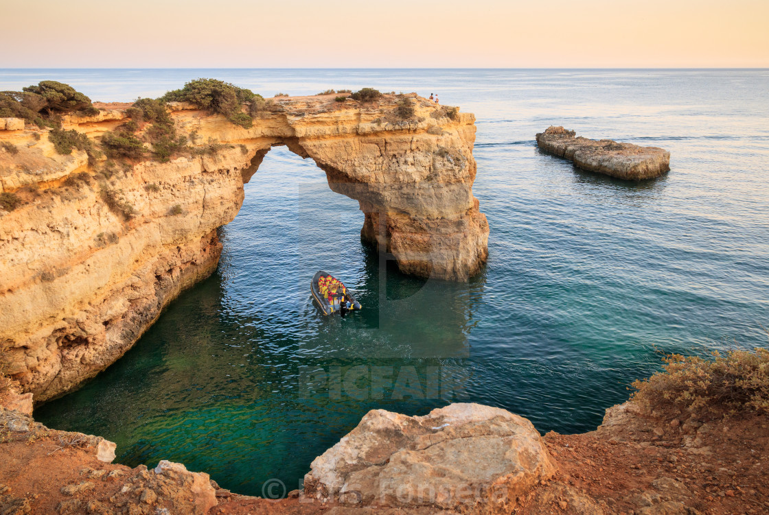 Albandeira Arch With A Tour Boat Passing Underneath In The Algarve Portugal License Download Or Print For 16 94 Photos Picfair
