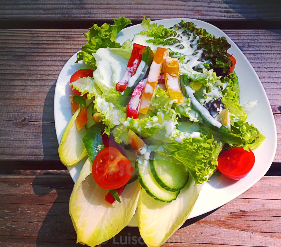 "Mixed salad with yogurt dressing" stock image