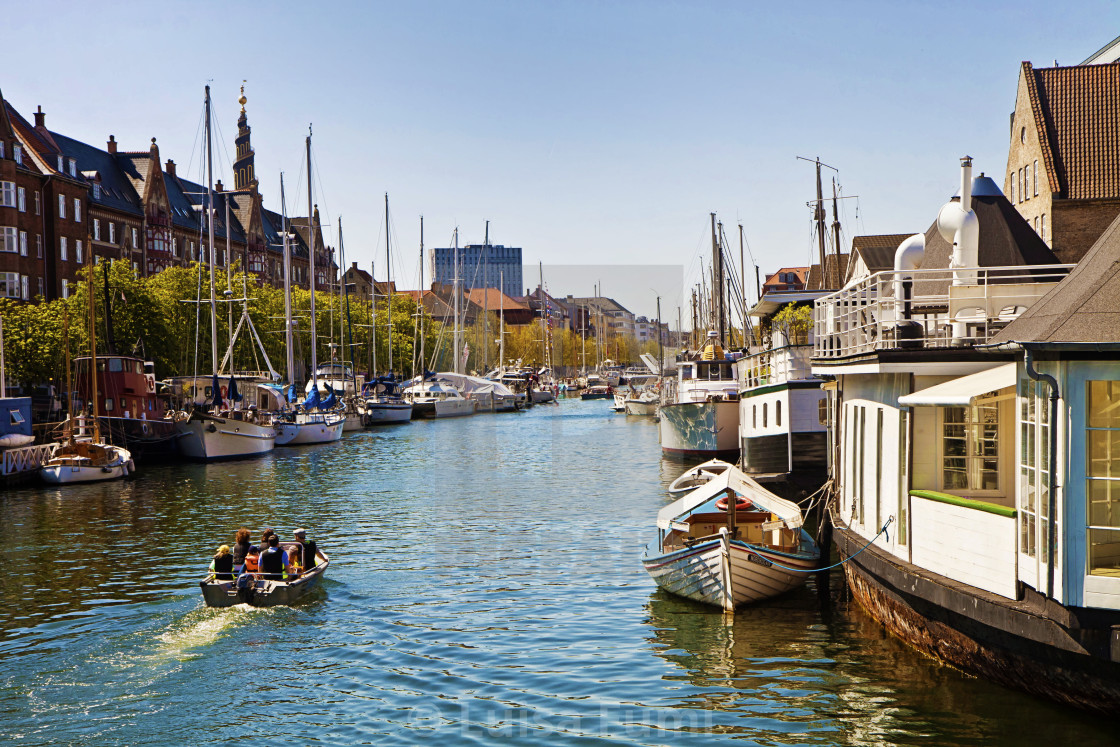 "Copenhagen, Denmark -Christianshavn main channel with boats moored" stock image