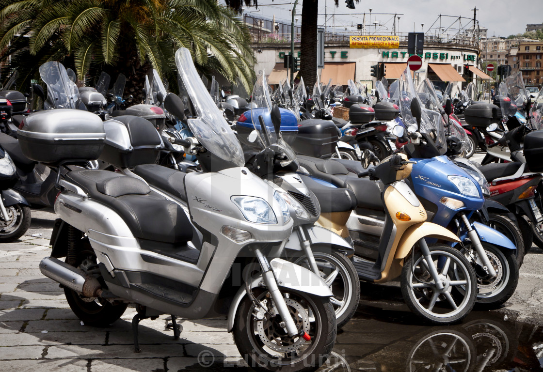 "Genoa, Italy- scooter parking in city center" stock image