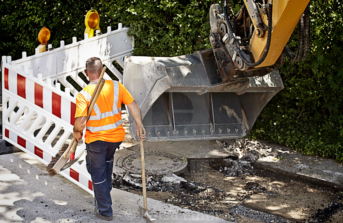 "Road repairing, worker observes a skid steer loader excavator at work ..." by Luisa Fumi - $10.12 "Road repairing, worker observes a skid steer loader excavator at work ..." stock image