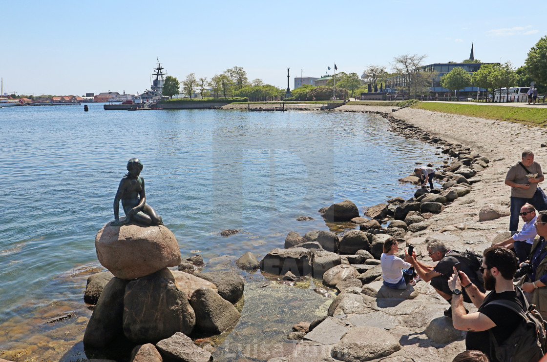 "COPENHAGEN, DENMARK - tourists take pictures and selfies with the Little mermaid" stock image