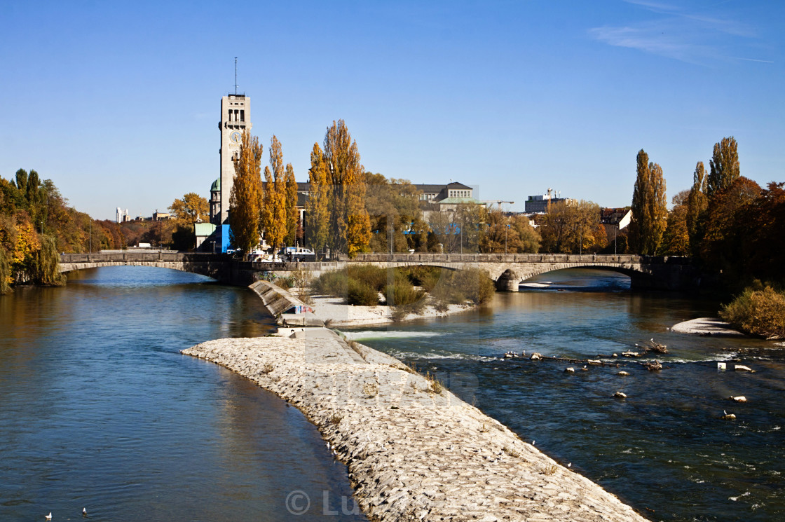 "autumnal view of the blue waters of Isar river in Munich" stock image