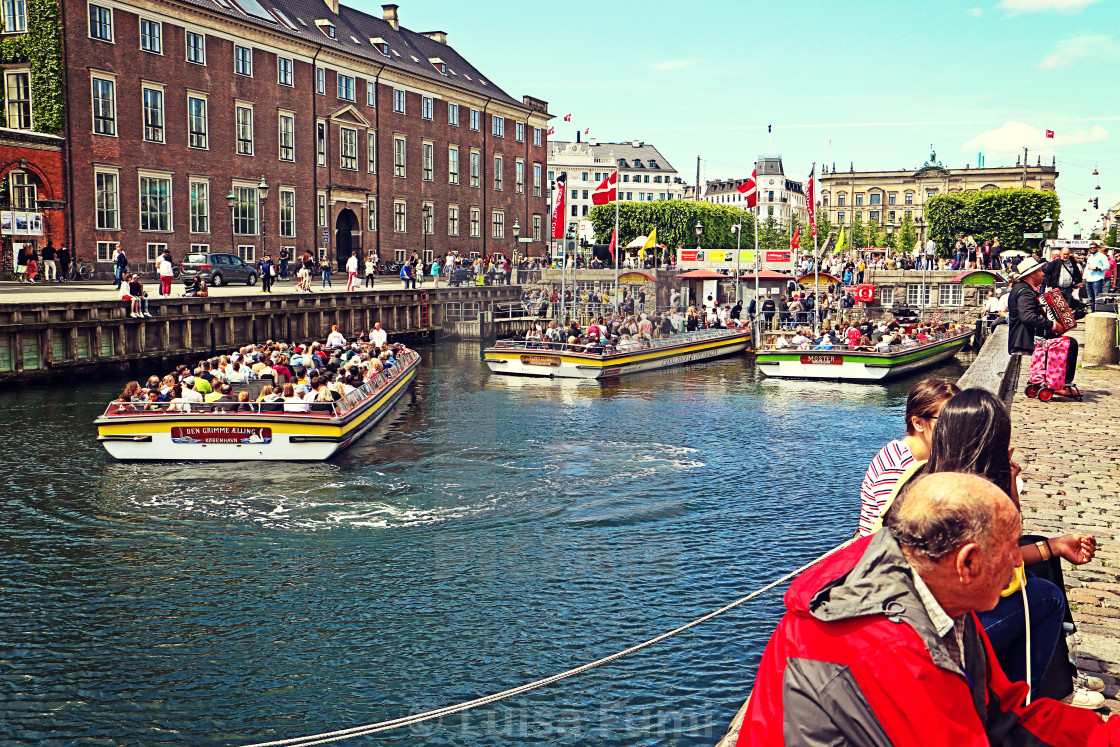 "COPENHAGEN, DENMARK - JUNE 16, 2019 Touristic boats at Nyhavn harbor, famous..." stock image