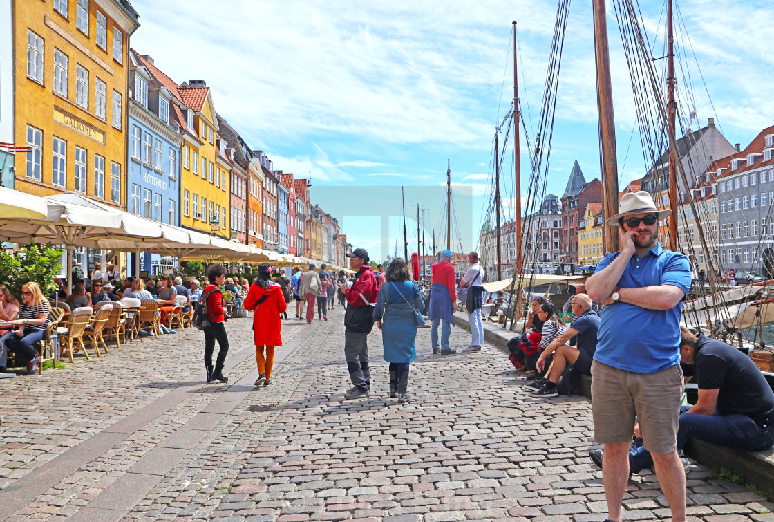 "COPENHAGEN, DENMARK - JUNE 16, 2019 Panoramic view of Nyhavn harbor..." by Luisa Fumi - $10.08 "COPENHAGEN, DENMARK - JUNE 16, 2019 Panoramic view of Nyhavn harbor..." stock image