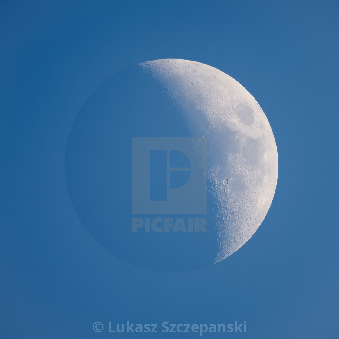 "Moon during the day against blue sky" by Lukasz Szczepanski - $20.81 "Moon during the day against blue sky" stock image