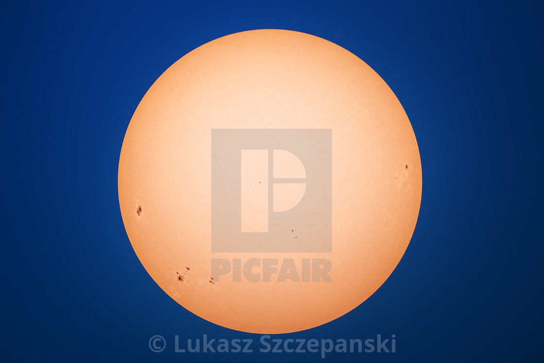 "Sun and sunspots angainst blue sky" by Lukasz Szczepanski - $24.31 "Sun and sunspots angainst blue sky" stock image