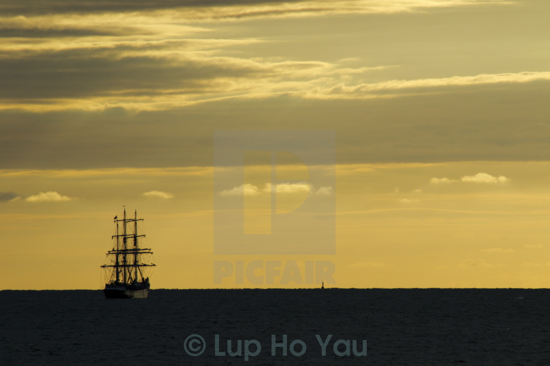 "Tall ship at sunset in France" by Lup Ho Yau - $4.67 "Tall ship at sunset in France" stock image