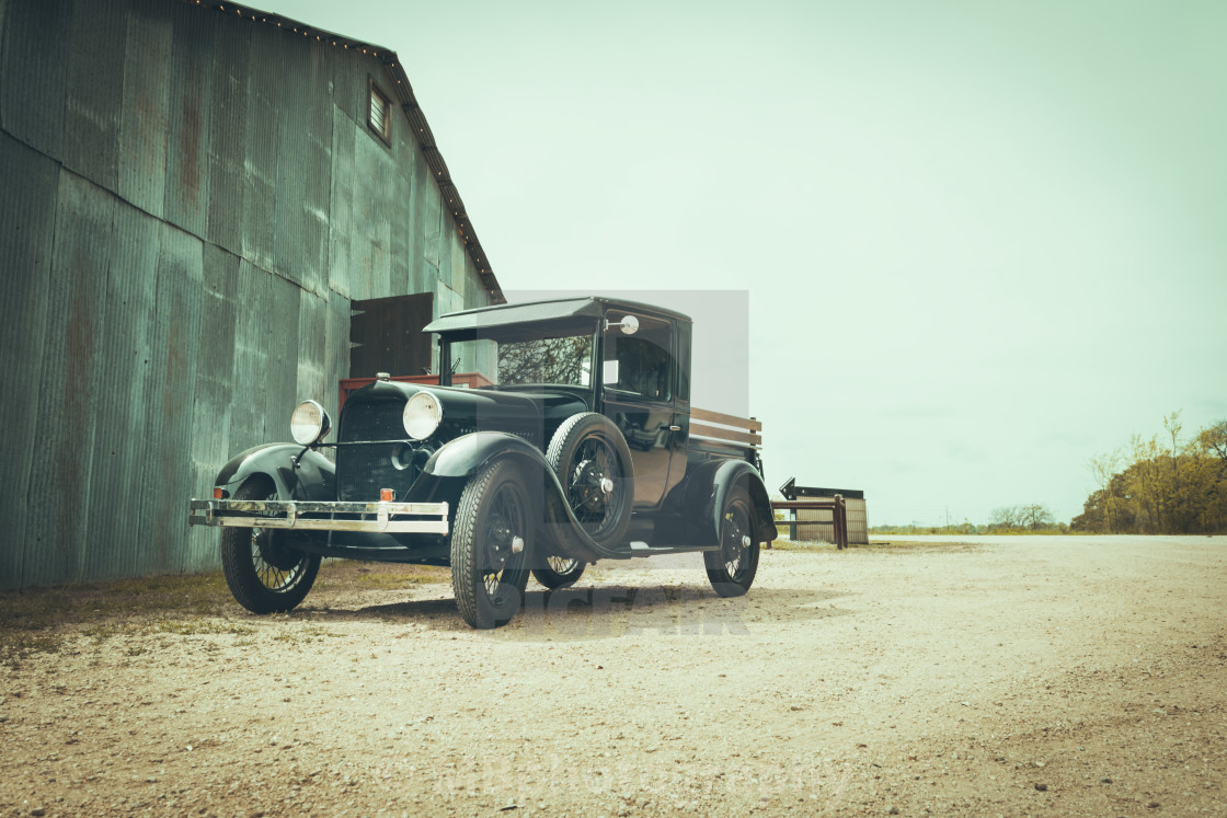 "Old car and a barn" stock image