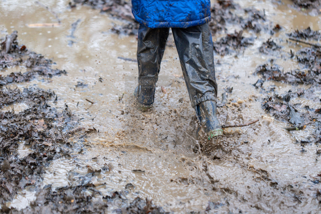 "Playing in Mud" stock image