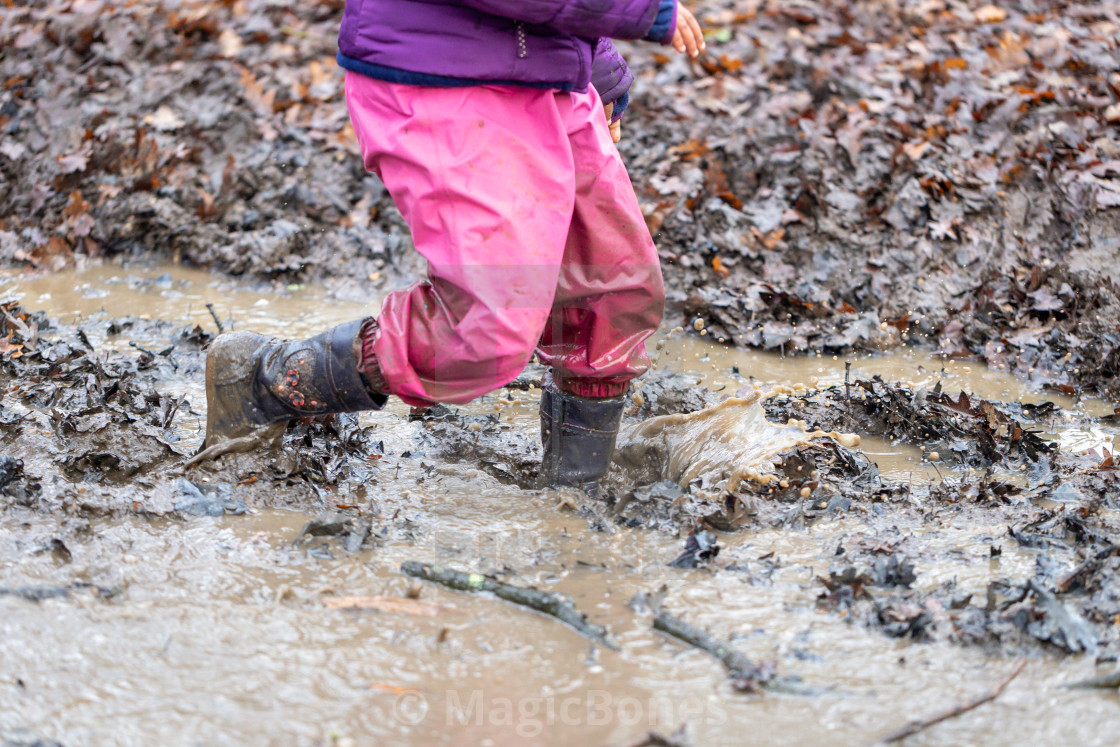 "Playing in Mud" stock image