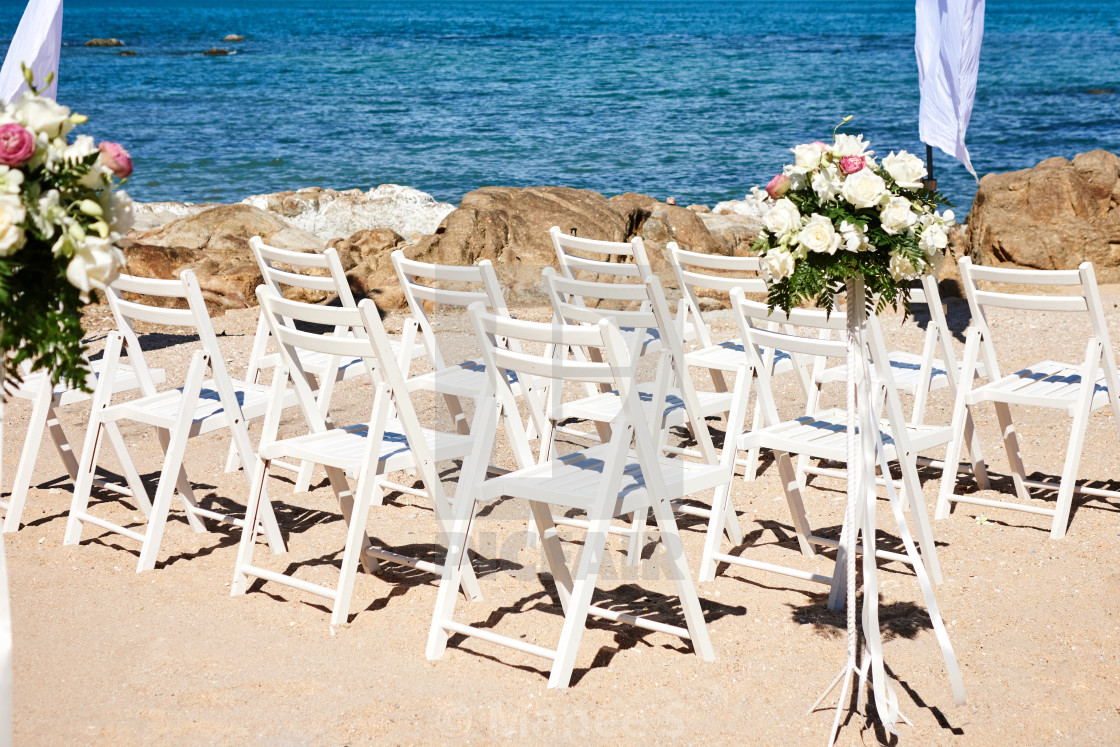 white chairs wedding