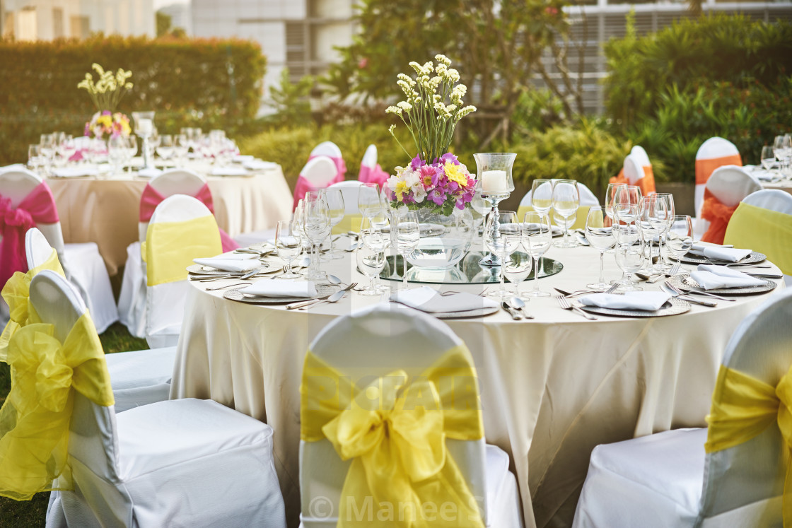Wedding Reception Dinner Table Setting With Flower Decoration And