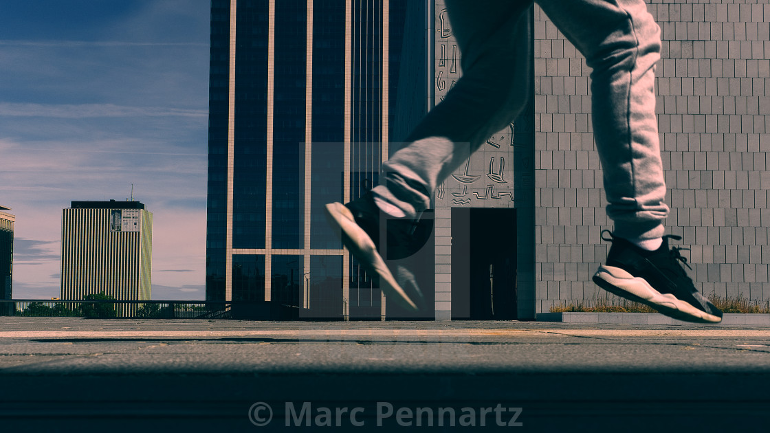 "Boy Jumping Outside Office Buildings Brussels" by Marc Pennartz - £12.40 "Boy Jumping Outside Office Buildings Brussels" stock image