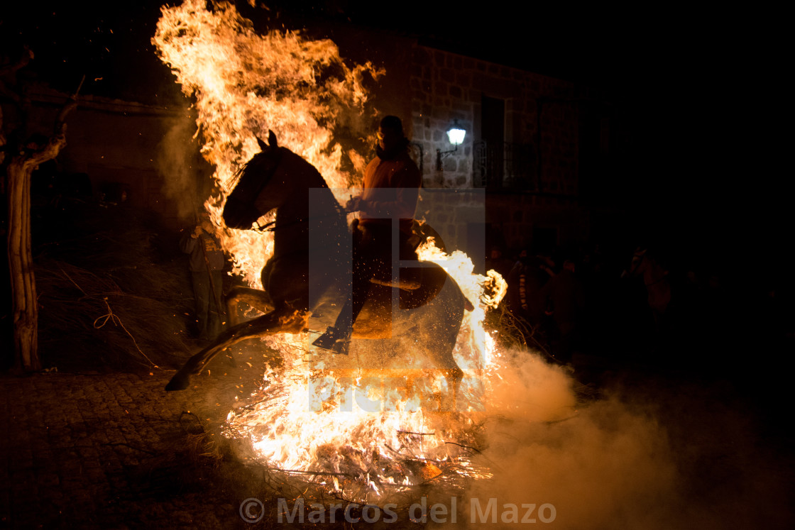 "Jumping a fire" by Marcos del Mazo - $15.39 "Jumping a fire" stock image