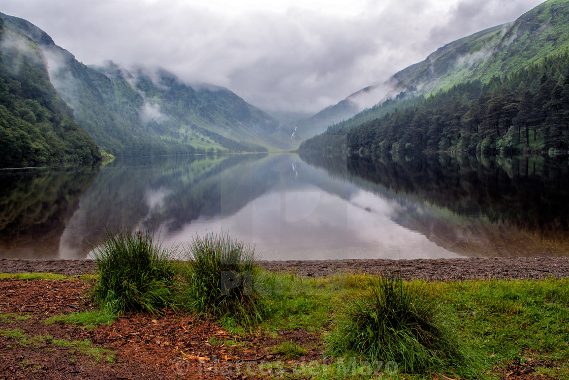 "Glendalough Lake with clouds" stock image