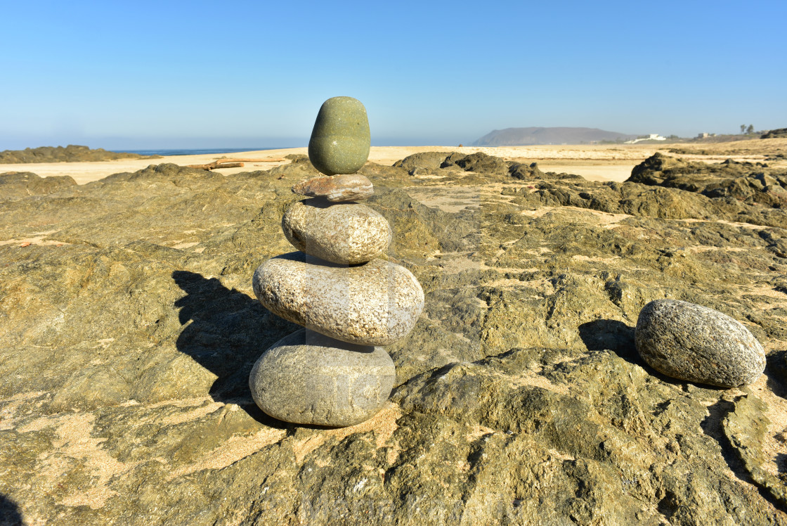 "Zen rock stack on Pacific coast beach Baja, Mexico" stock image