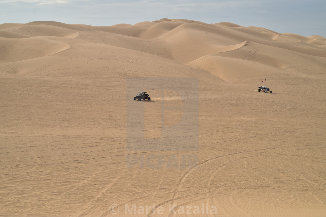 "ATV recreational vehicle off-road sand dune driving on Imperial Sand Dunes, California, USA" by Marie Kazalia - $15.16 "ATV recreational vehicle off-road sand dune driving on Imperial Sand Dunes, California, USA" stock image