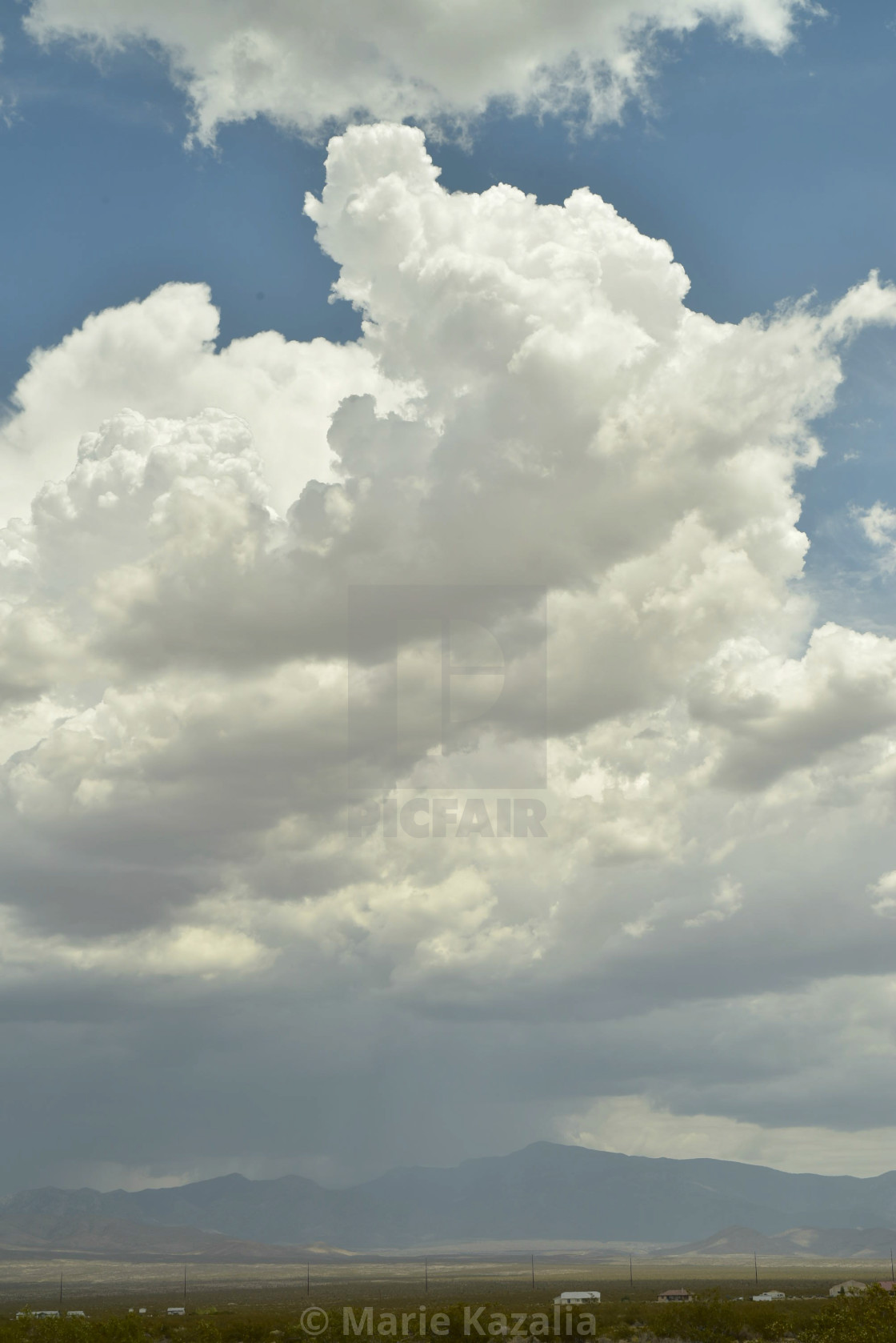 "billowy rain cloud raining on the Mojave Desert landscape of Pahrump, Nevada, USA" by Marie Kazalia - $15.29 "billowy rain cloud raining on the Mojave Desert landscape of Pahrump, Nevada, USA" stock image
