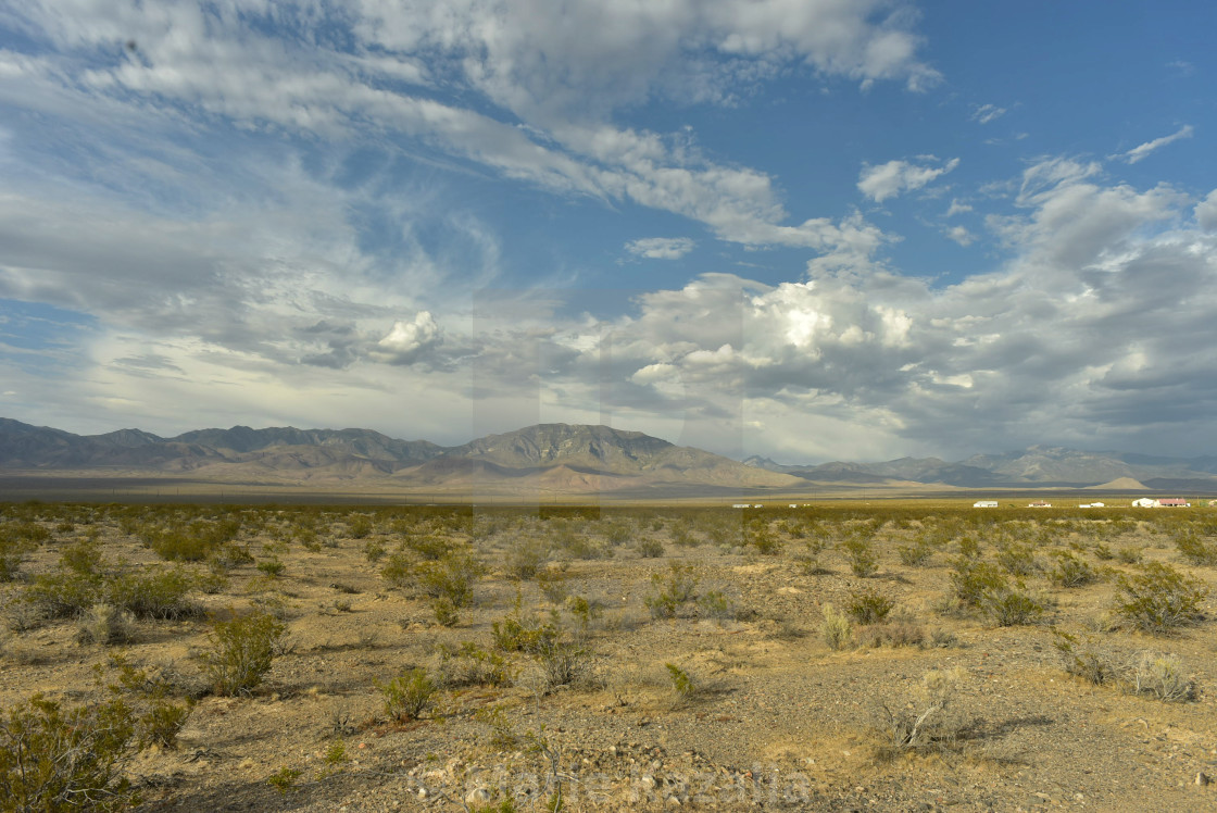 "white clouds in blue sky over Mojave Desert, Nevada, USA" by Marie Kazalia - $15.29 "white clouds in blue sky over Mojave Desert, Nevada, USA" stock image