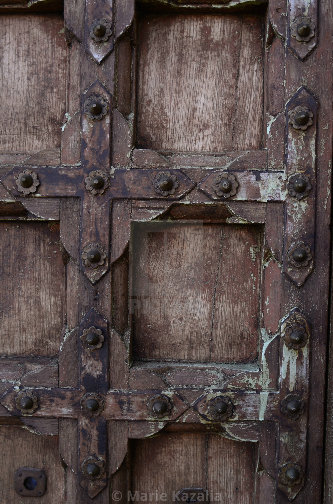 "rustic old wood door with antique metalwork details Baja, Mexico" by Marie Kazalia - $15.16 "rustic old wood door with antique metalwork details Baja, Mexico" stock image