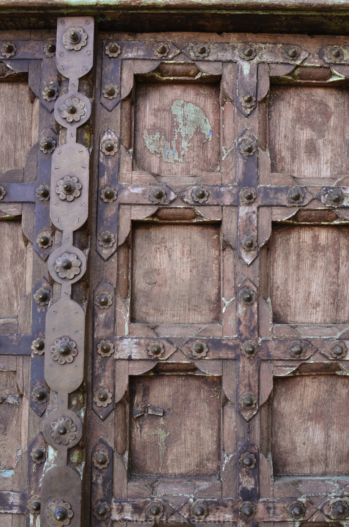 "rustic old wood door with antique metalwork details Baja, Mexico" by Marie Kazalia - $15.44 "rustic old wood door with antique metalwork details Baja, Mexico" stock image