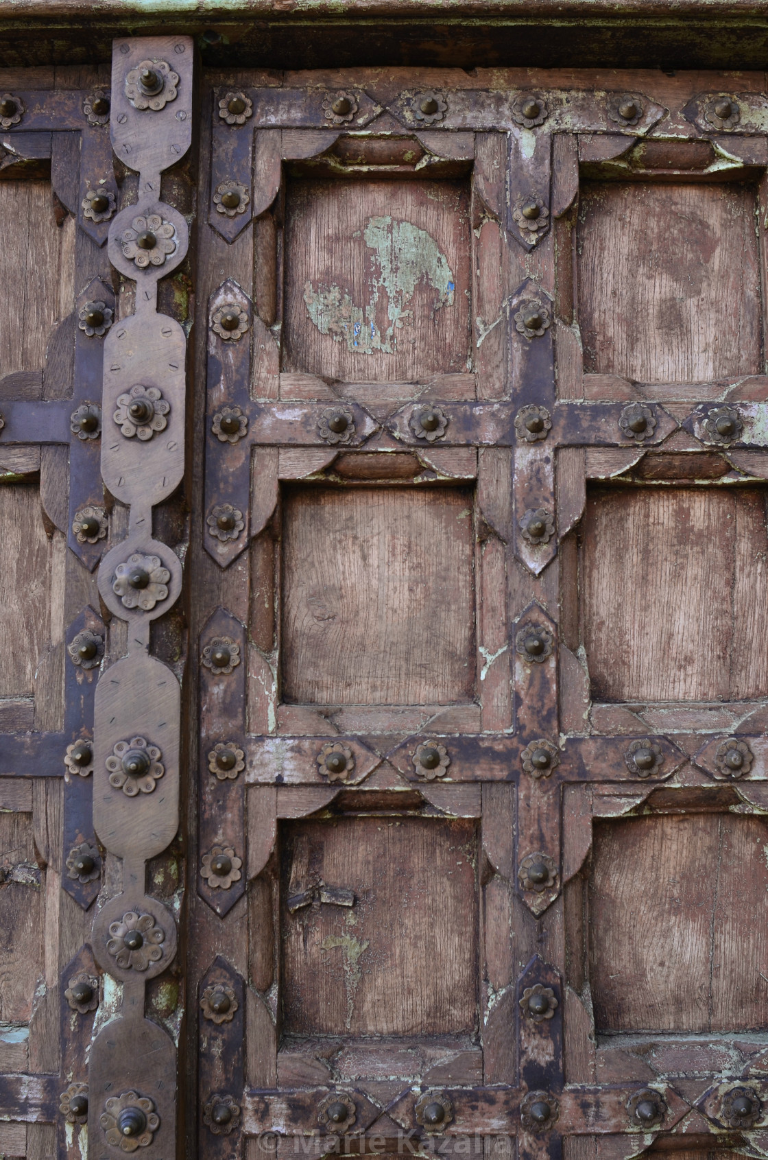 "rustic old wood door with antique metalwork details Baja, Mexico" by Marie Kazalia - $15.44 "rustic old wood door with antique metalwork details Baja, Mexico" stock image