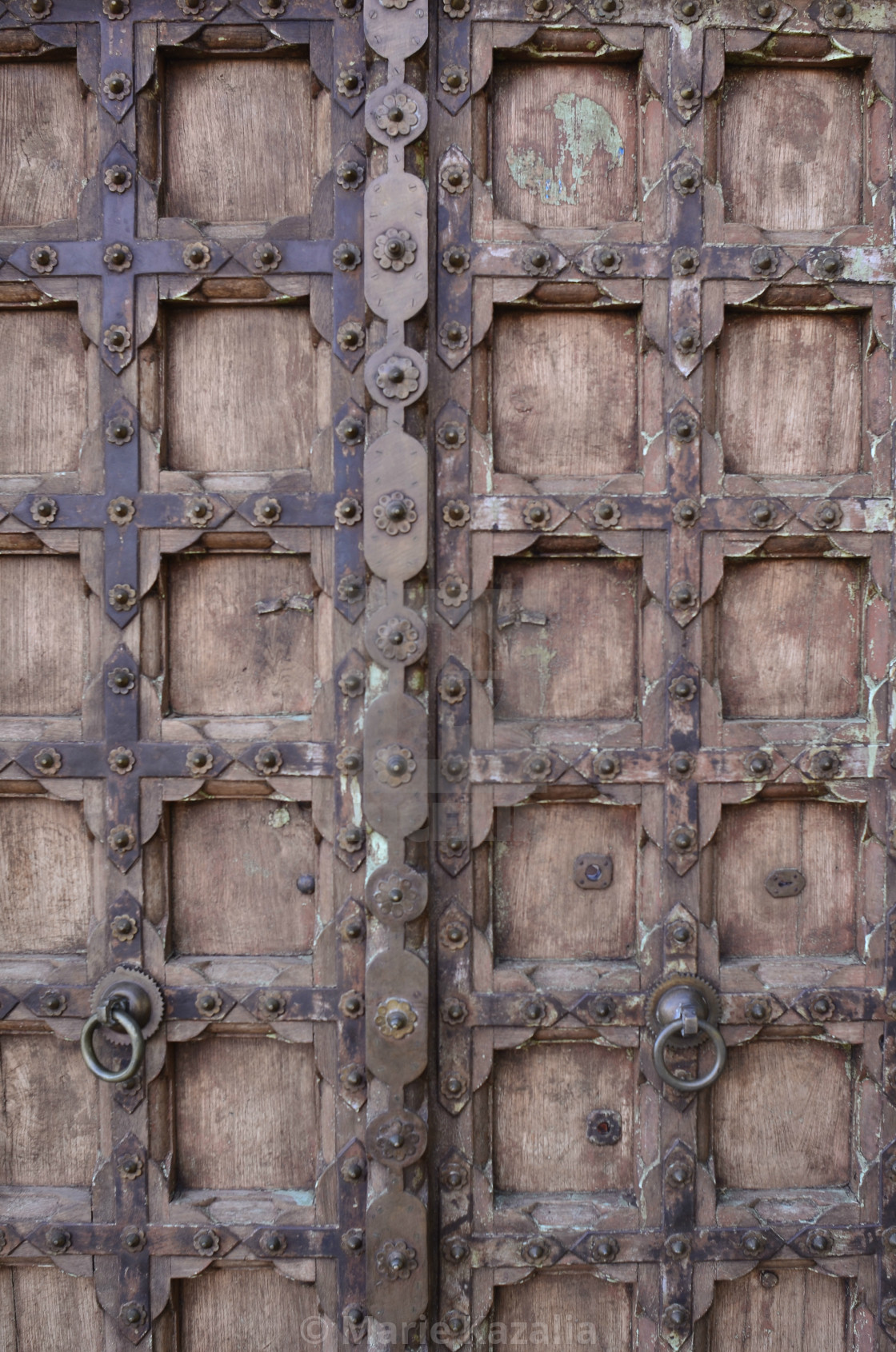 "rustic old wood door with antique metalwork details Baja, Mexico" by Marie Kazalia - $15.44 "rustic old wood door with antique metalwork details Baja, Mexico" stock image