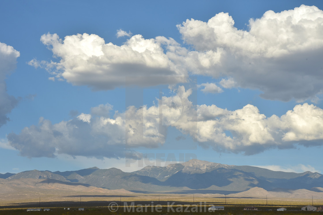 "billowy clouds over Mojave Desert landscape Nevada, USA" by Marie Kazalia - $15.16 "billowy clouds over Mojave Desert landscape Nevada, USA" stock image