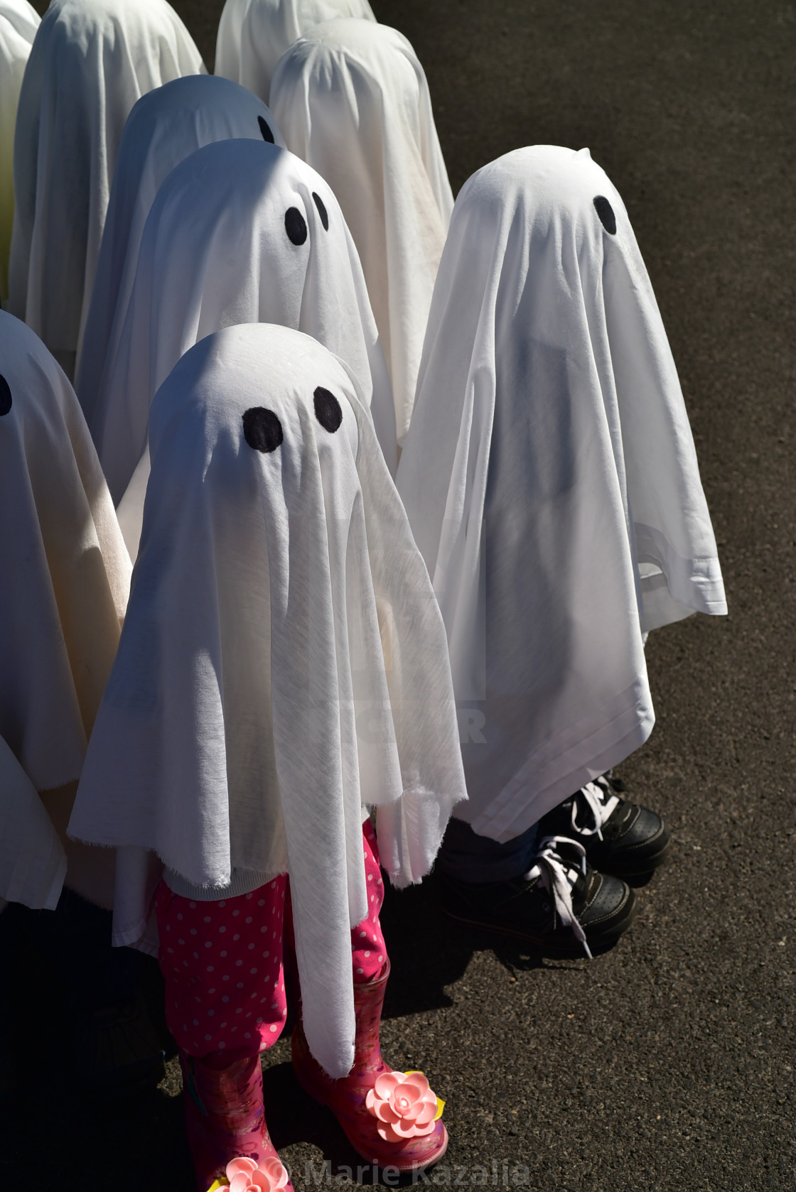 "Halloween ghost figures wearing little shoes!" stock image