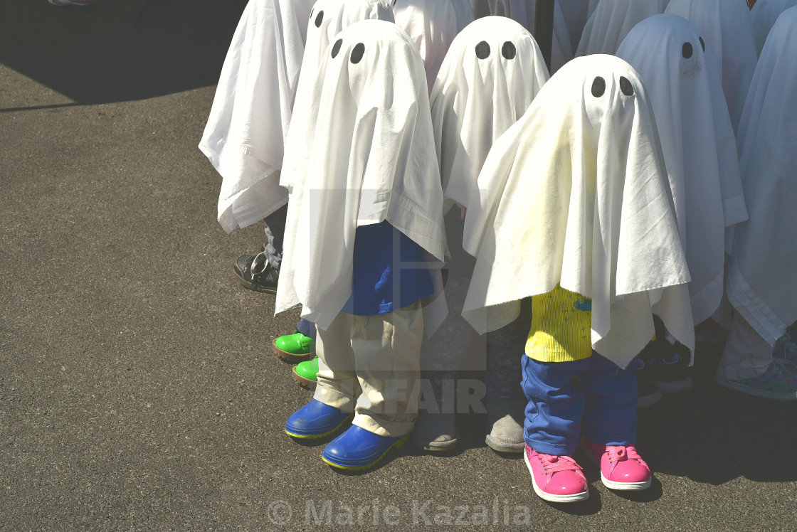 "Halloween ghost figures wearing tiny shoes!" by Marie Kazalia - $15.16 "Halloween ghost figures wearing tiny shoes!" stock image