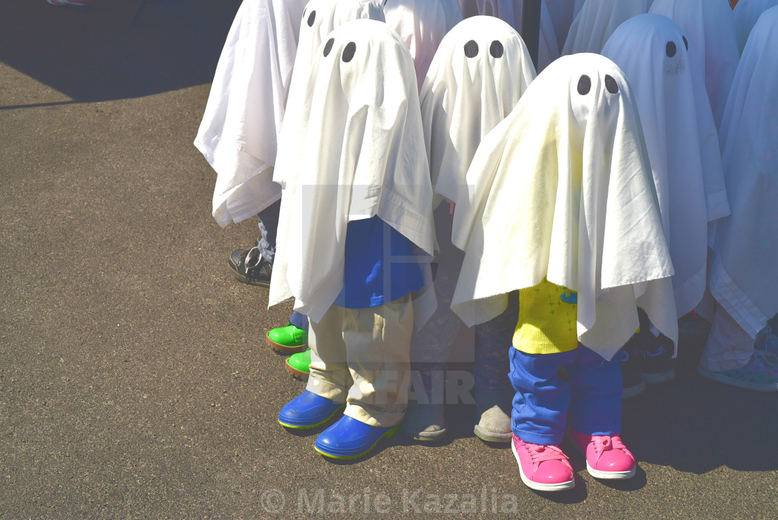 "Halloween ghost figures wearing little shoes!" by Marie Kazalia - $15.16 "Halloween ghost figures wearing little shoes!" stock image