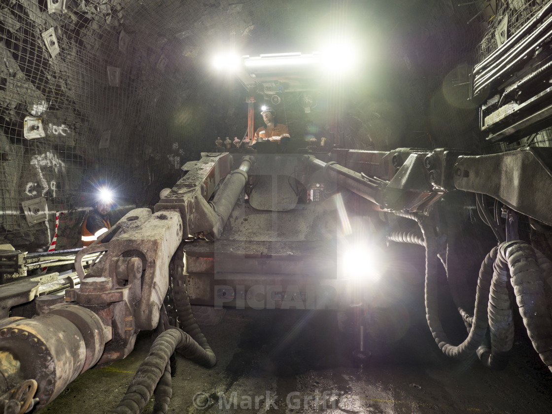 "Jumbo working underground" stock image