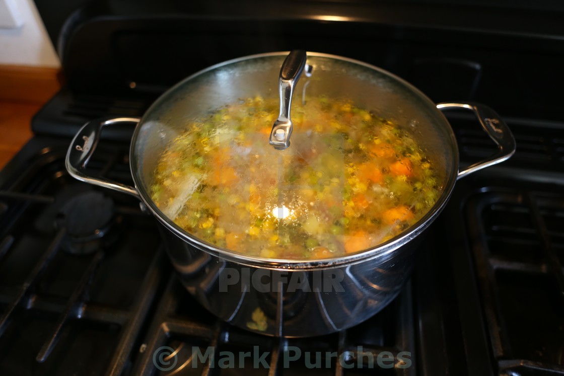 "Home Made Vegetable Soup Cooking in Sauce Pan" stock image