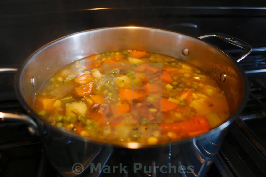 "Home Made Vegetable Soup Cooking in Sauce Pan" stock image