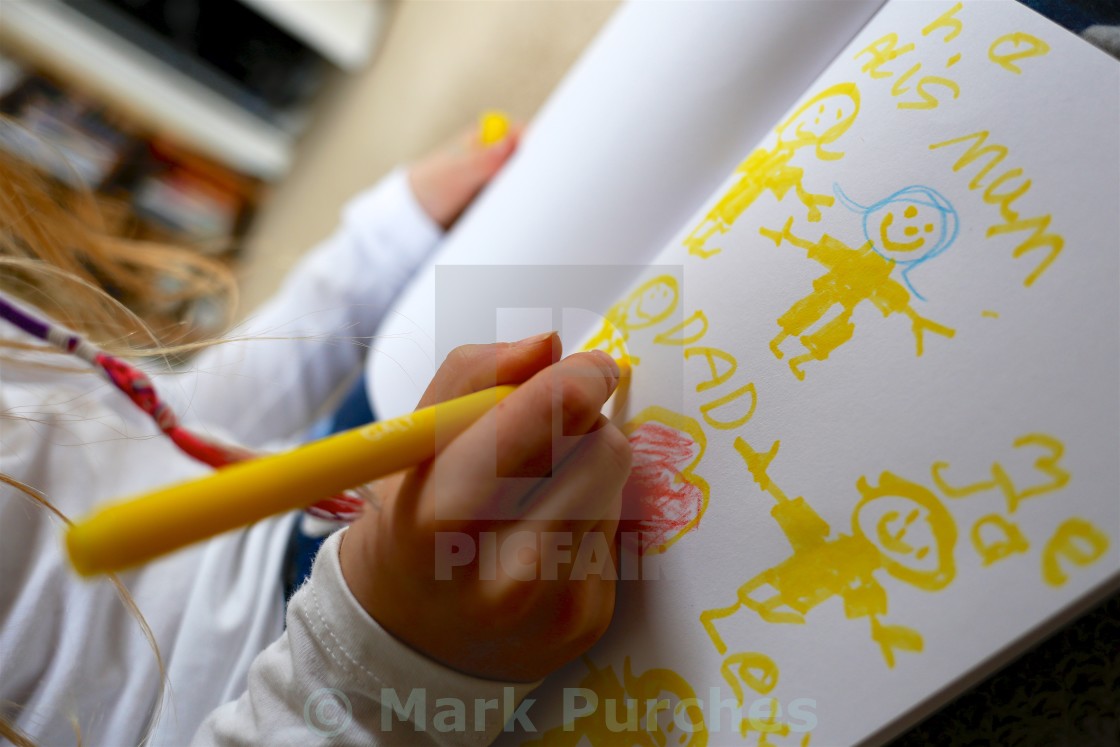 "Child/Girl Drawing Picture for Mother's Day" stock image