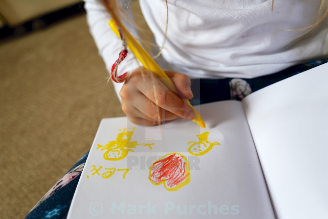 "Child/Girl Drawing Picture for Mother's Day" stock image