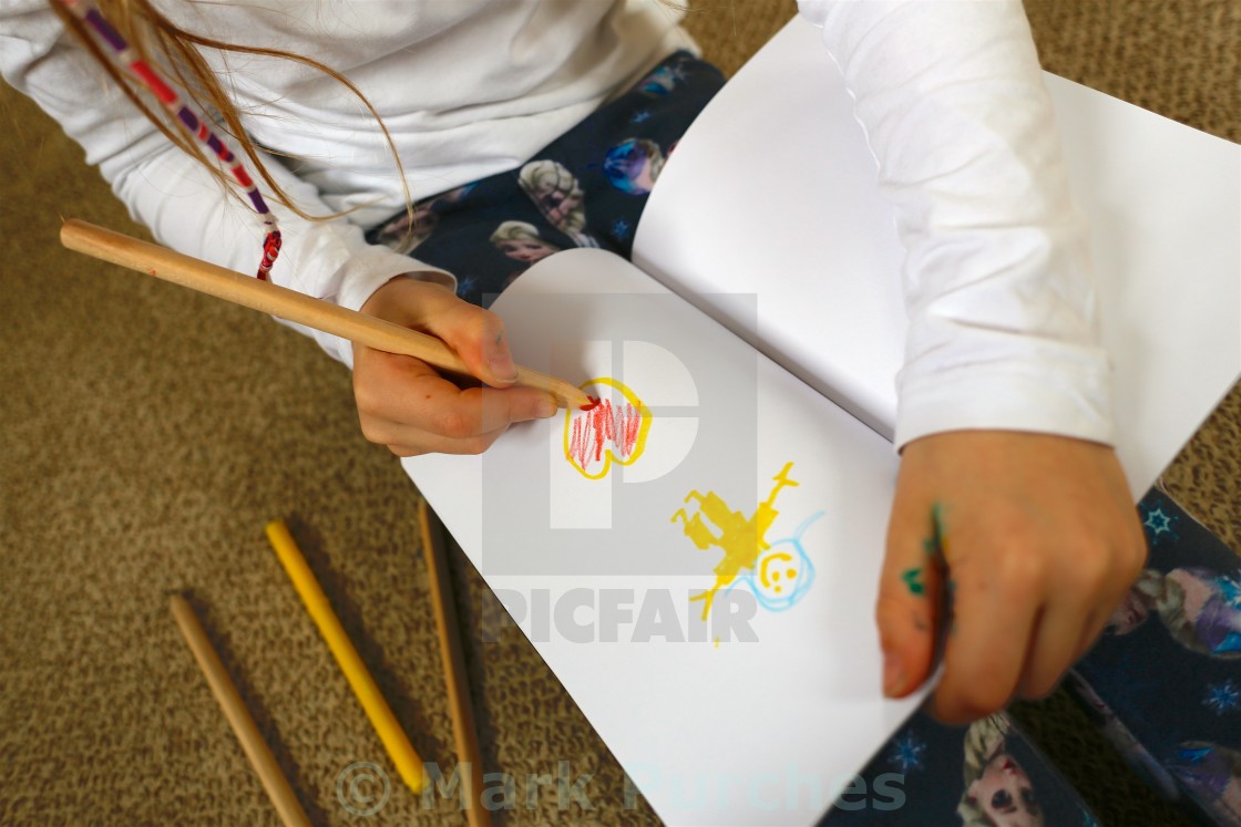 "Child/Girl Drawing Picture for Mother's Day" stock image