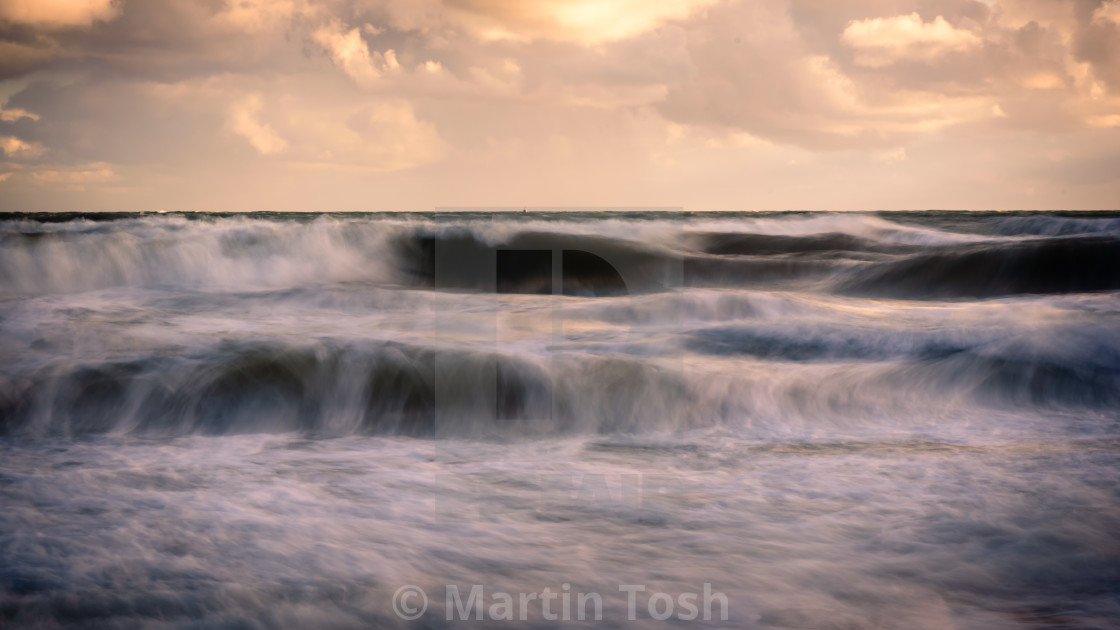 "Incomming. waves rolling in" stock image