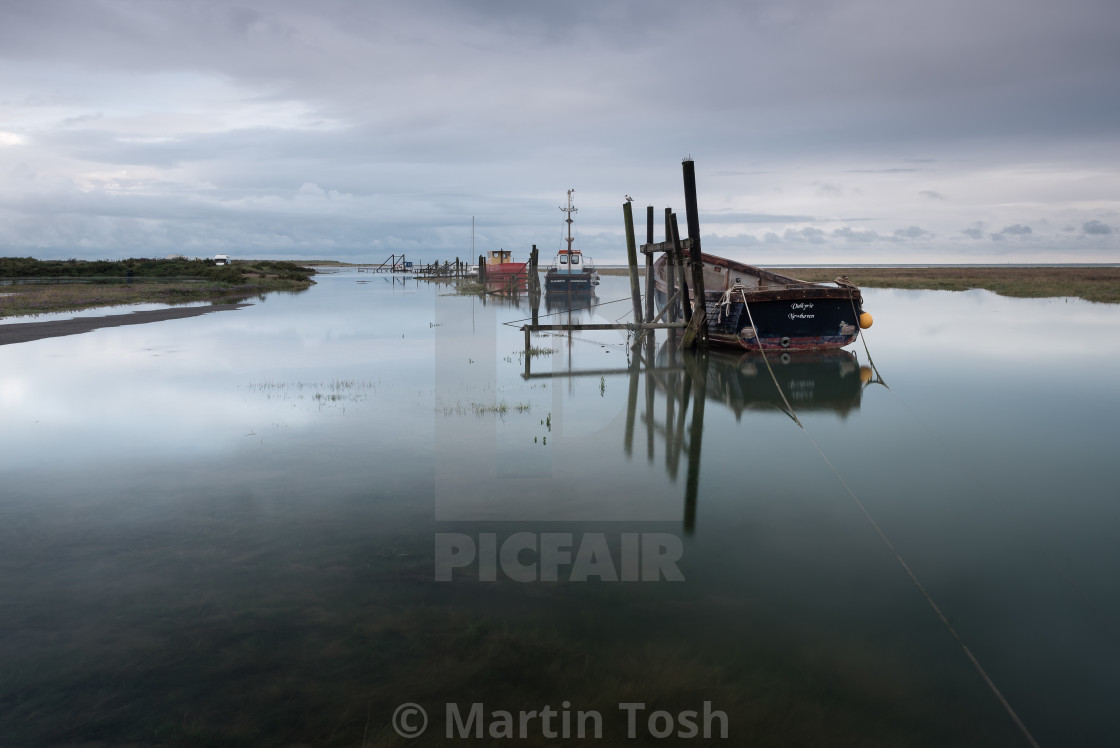 "Thornham Quay morning, saltmarsh and creek V Flood tide" stock image