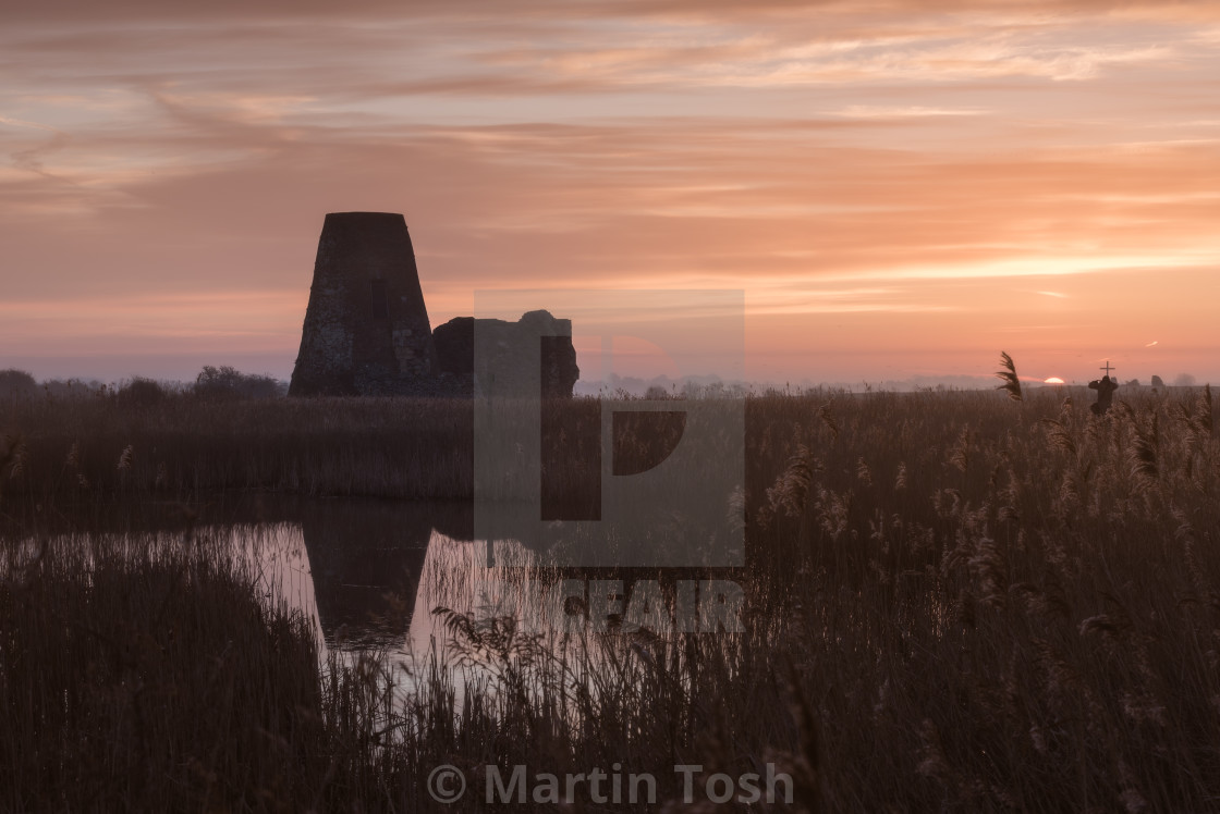 "Start of day at St Benet's Abbey IV. Abbey ruins and reflection at sunrise,..." stock image