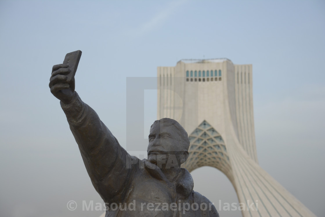 Taking a selfie with phone sculpture Azadi tower at background - License,  download or print for £ | Photos | Picfair