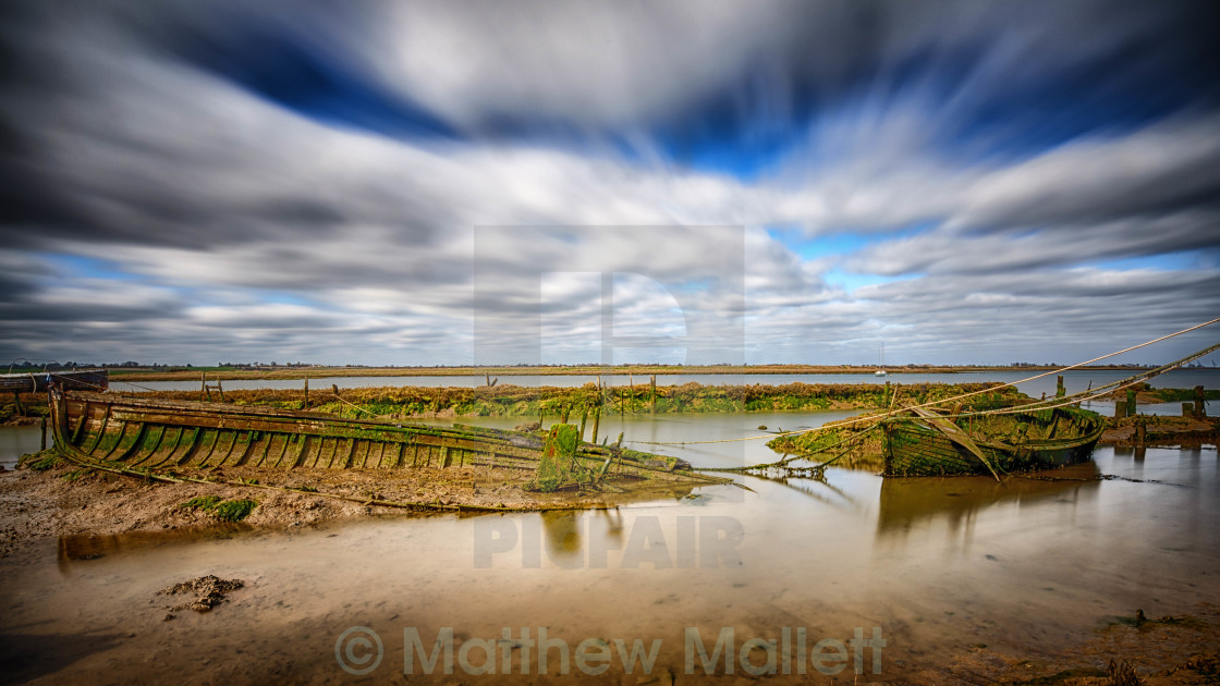 "Fading Boats Fast Moving Sky" stock image