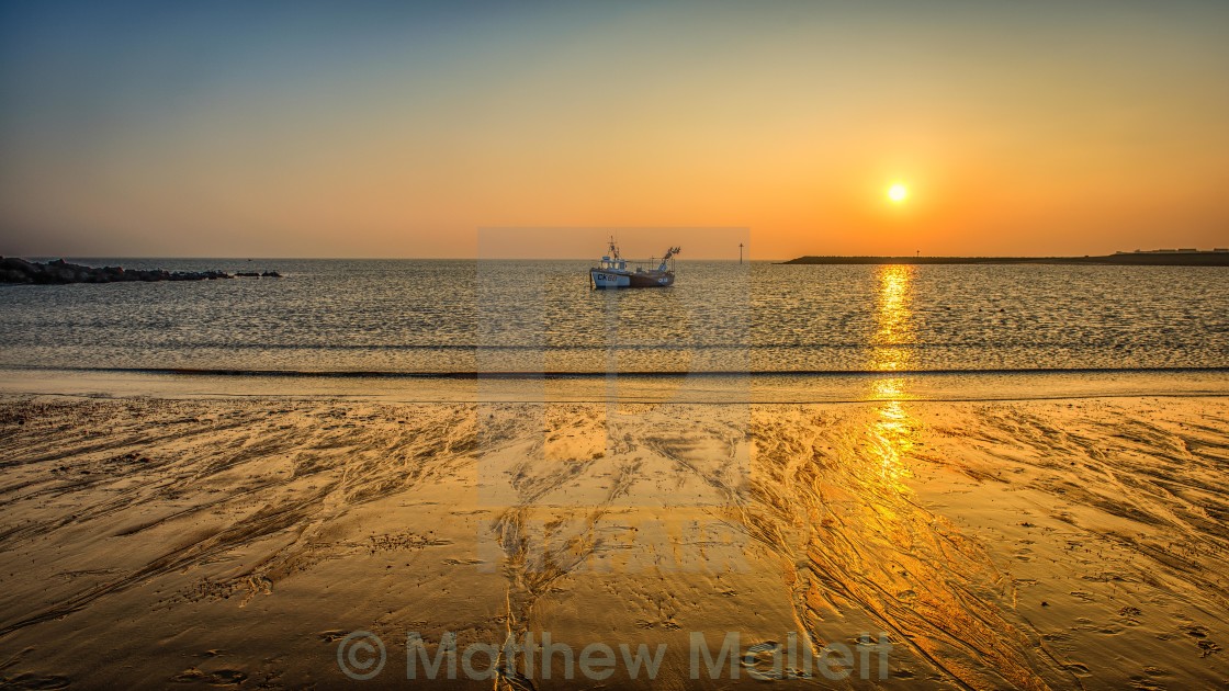 "Golden Sunset Over the Bay" stock image